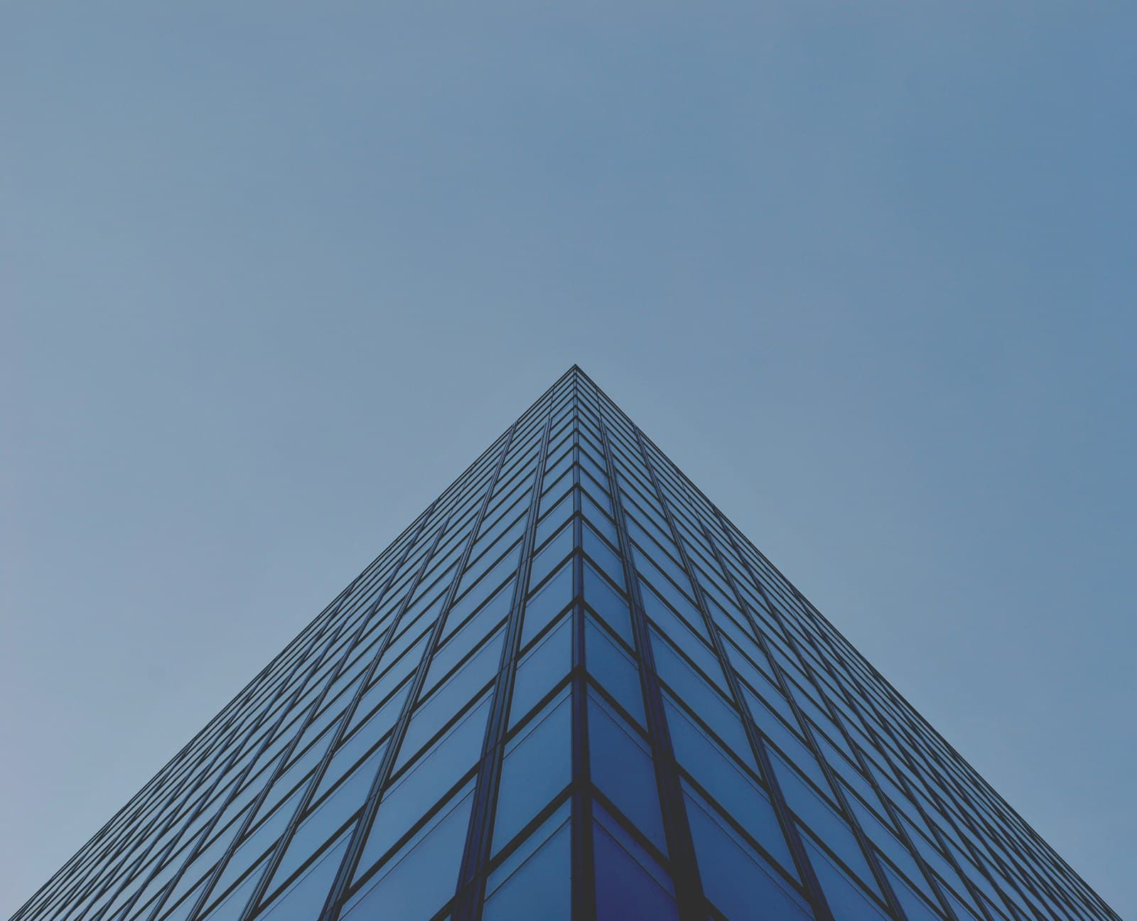 Abstract architectural facade of a glass office tower